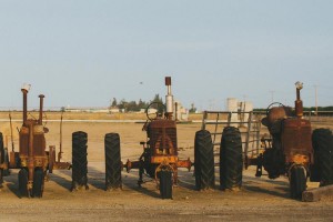 Row-of-antique-tractors-R-Friend-And-Company-750x500